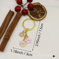 Zinc Alloy Gold Daisy Flower Keychain Gift Bag Charm view 2