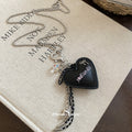 Vacation Style Leather Cotton Cord Necklace With Stainless Steel Heart Bow Tooth Pendant view 4