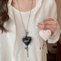 Vacation Style Leather Cotton Cord Necklace With Stainless Steel Heart Bow Tooth Pendant view 1