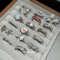 Light Luxury Copper Zircon Hollow Flower Bow Star Geometric Index Finger Ring For Women view 1