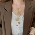 Light Luxury Metal Geometric Round Textured Tassel Sweater Necklace For Women view 2