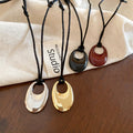 Light Luxury Alloy Oval Hollow Pendant Necklace For Women Minimalist Painted Collarbone Jewelry view 4