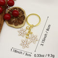 Alloy Snowflake Bell Keychain Christmas Gift – Gold view 2