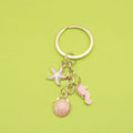 Zinc Alloy Shell Starfish Keychain Pearl Bag Charm Gift – Gold view 1
