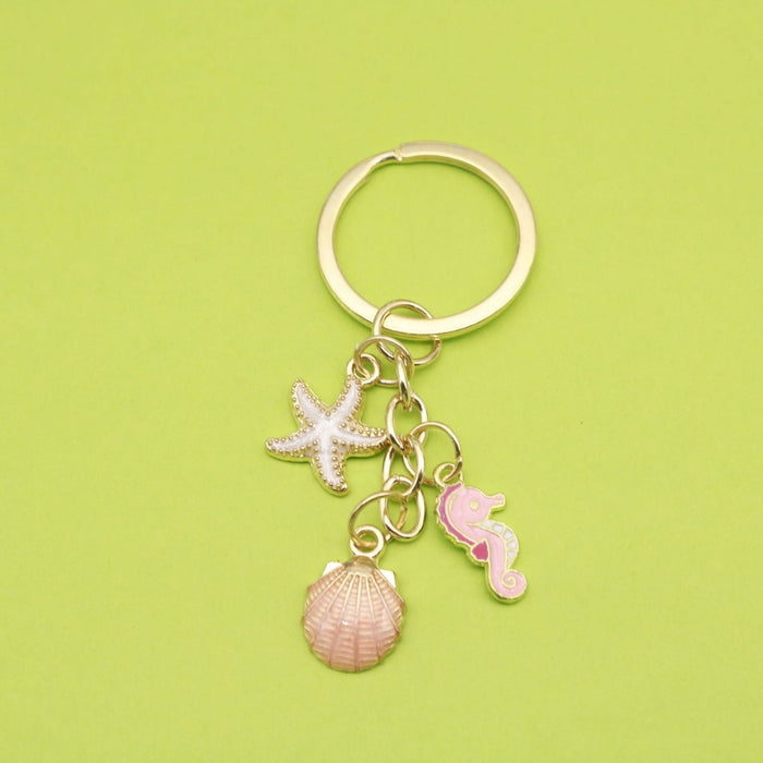 Zinc Alloy Shell Starfish Keychain Pearl Bag Charm Gift – Gold