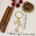 Zinc Alloy Shell Starfish Keychain Pearl Bag Charm Gift – Gold view 2