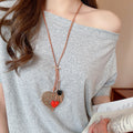 Light Luxury Acrylic Heart Outline Pendant Leather Cord Sweater Necklace For Women view 3