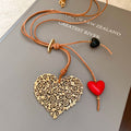Light Luxury Acrylic Heart Outline Pendant Leather Cord Sweater Necklace For Women view 4