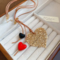 Light Luxury Acrylic Heart Outline Pendant Leather Cord Sweater Necklace For Women view 2