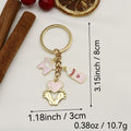 Zinc Alloy Baby Clothes Footprint Keychain Bag Charm Gift view 2