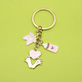 Zinc Alloy Baby Clothes Footprint Keychain Bag Charm Gift view 1