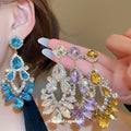 Light Luxury Copper Teardrop Drop Earrings With Silver Posts And Rhinestone Hollow Tassel Design view 2