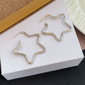 Silver Hollow Five Point Star Alloy Hoop Earrings For Women Unique Light Luxury Face Slimming Earrings view 4