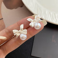 Elegant Silver Alloy Bowknot Pearl Stud Earrings For Women, Vintage Minimal Niche Design Versatile Earrings view 2