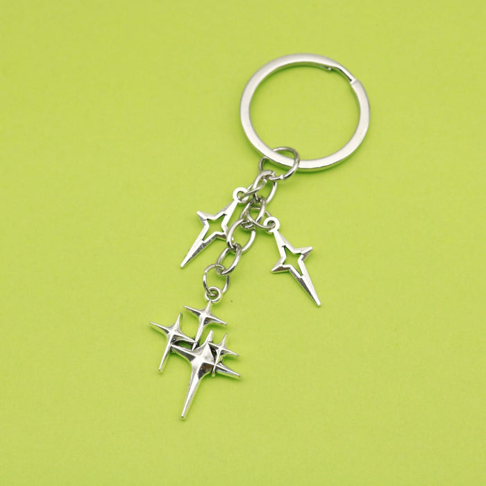 Zinc Alloy Hollow Four Point Star Keychain Car Bag Charm