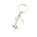 Zinc Alloy Hollow Four Point Star Keychain Car Bag Charm view 5