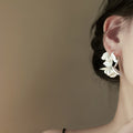 Minimalist C-Shaped Faux Pearl Flower Stud Earrings With Silver Pin Floral Design view 2