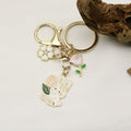 Metal Cartoon Rose Bunny Keychain New Year Gift Bag Charm view 3