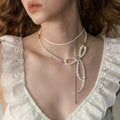 Light Luxury Faux Pearl Bow Chain Tassel Double Layer Clavicle Necklace for Women view 1