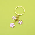 Metal Cute Cherry Blossom Flower Keychain Cup Bag Car Charm view 1