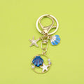 Zinc Alloy Pearl Shell Starfish Keychain Ocean Bag Charm view 1