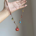 Light Luxury Mixed Material Braided Cord Enamel Apple Teardrop Pendant Sweater Necklace view 4