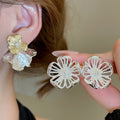 Metal Hollow Flower Stud Earrings Light Luxury Minimalist Fashion Earrings For Women view 2