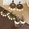 Vintage Ethnic Alloy Drop Earrings With Teardrop Wood Bead Geometric Round Tassel Pendant view 3