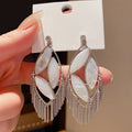 Light Luxury Vintage Hollow Oval Tassel Alloy Drop Earrings With Silver Posts view 3