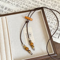 Vacation Style Wax Cord Round Ceramic Wood Bead Tassel Pendant Sweater Necklace For Women view 2