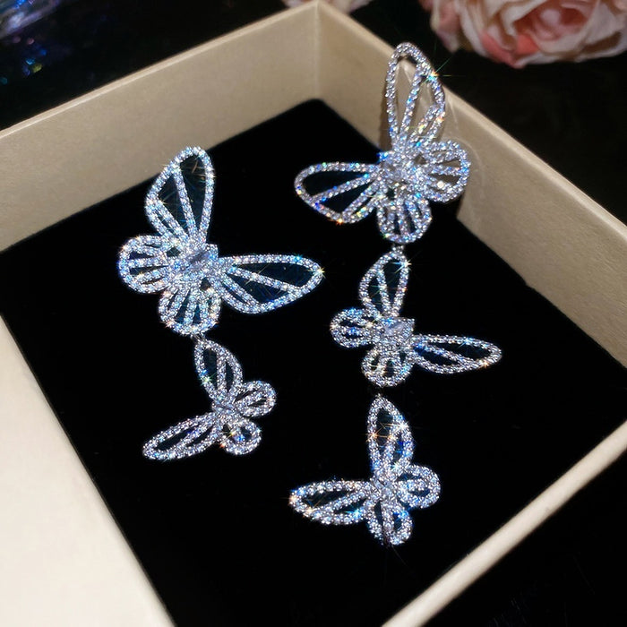 Light Luxury Copper Zircon Hollow Butterfly Asymmetric Drop Earrings With Silver Posts