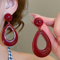 Burgundy Resin Teardrop Hollow Pendant Drop Earrings With Silver Posts Vintage Light Luxury Style view 1