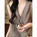 Light Luxury Wooden Bead Hollow Round Teardrop Leaf Pendant Sweater Necklace For Women view 4