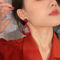 Vintage Hong Kong Style Resin Hollow Round Teardrop Pendant Drop Earrings For Women view 2
