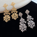 Alloy Hollow Flower Tassel Drop Earrings With Silver Needle Court Style Floral Stud Design view 4