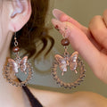 Vintage Ethnic Alloy Wood Bead Butterfly Flower Geometric Round Pendant Drop Earrings view 1