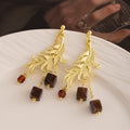Vintage Luxury Gold Alloy Feather Leaf Dangle With Brown Square Crystal Bead Tassel Earrings view 3