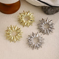 Luxury Irregular Radiant Sunflower Alloy Studs For Women, 3D Hollow Polygon Metal Sunburst Earrings view 1