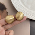 Elegant Brushed Gold Alloy Round Ball Stud Earrings For Women Minimalist Geometric Commuter Fashion Earrings view 2