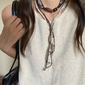 Maillard Style Vintage Acrylic Fabric Adjustable Scarf Sweater Necklace With Geometric Oval Round Pendant view 4