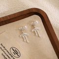 French Luxury Pearl Stud Bowknot Drop Alloy Rhinestone Lace Hollow Dangle Fashion Earrings view 2