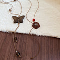 Vintage Ethnic Wood Flower Lotus Butterfly Crystal Pendant Sweater Necklace For Women view 2