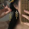 Vintage Alloy Rhinestone Starburst Teardrop Tassel Drop Earrings Light Luxury Statement Jewelry for Women view 2