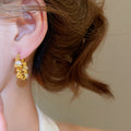 Chic Faux Pearl Twisted U Shaped Drop Earrings For Women Elegant Light Luxury Round Ear Jewelry view 3