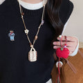 Light Luxury Fabric Wood Bead Apple Coffee Cup Colorful Pendant Sweater Necklace For Women view 1