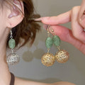 New Chinese Style Resin Round Hollow Pendant Drop Earrings For Women, Palace Inspired Light Luxury Ear Hooks view 2