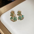 Light Luxury 18K Gold Plated Copper Flower Waterdrop Jewelry Set With Bracelet Stud Earrings Necklace view 3