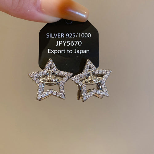 Light Luxury Copper Star Saturn Zircon Drop Earrings With Silver Needle Style