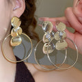 304 Stainless Steel Irregular Round Disc Drop Earrings Exaggerated Geometric Luxury Style view 1
