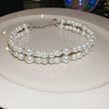 Light Luxury Faux Pearl Crystal Beaded Cross Double Layer Sweater Necklace For Women view 4